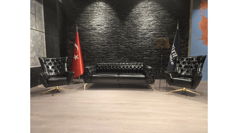 Tilia dönerli Chester ofis oturma grubu, siyah deri kapitone, gold renkli metal döner ayaklı tekli koltuklar ve sabit kanepeden oluşur.